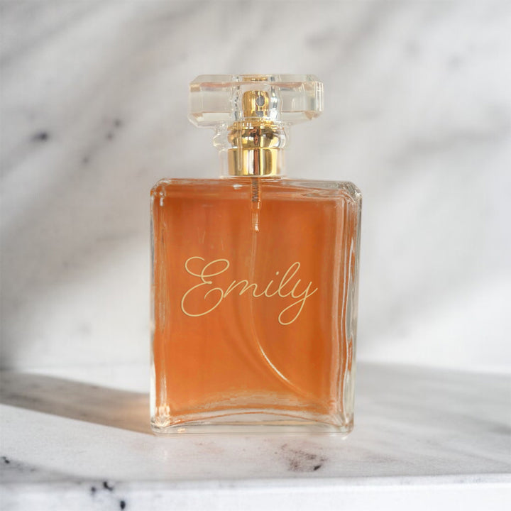 Personalized perfume bottle engraved with a name, elegant bridal gift